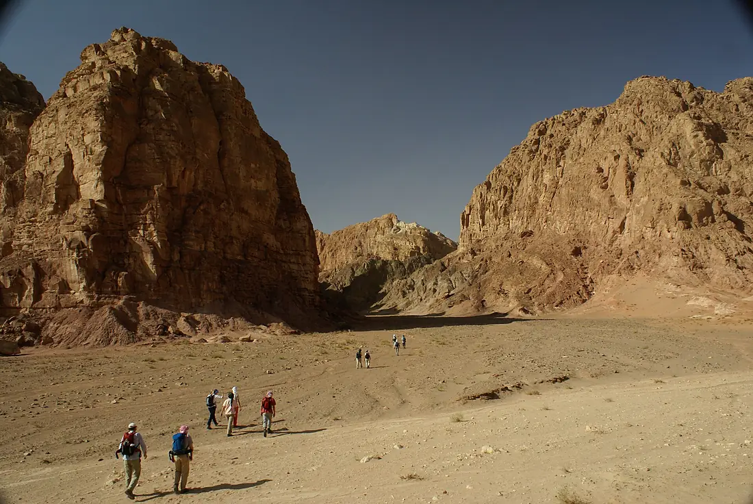 Hikers in wadi on Sinai